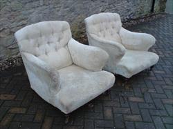 Antique armchairs by Howard and Sons of Berners Street in London.jpg